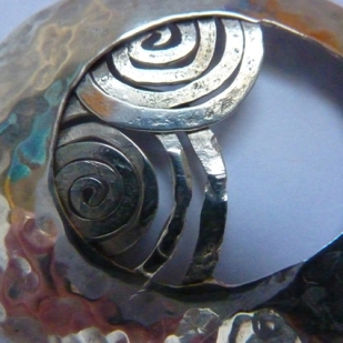 peeping silver spirals pendant